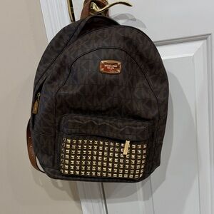 Michael Kors studded backpack style